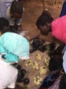 My friend buying vegetables from the market in Nwoya