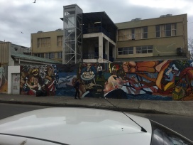 A mural we found in Valpo. If you look closely you can see the American eagle wrapping its claws around a Chilean couple and an American politician eating the country of Chile.